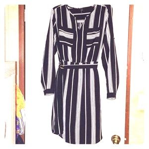 Black and white long sleeve knee length dress